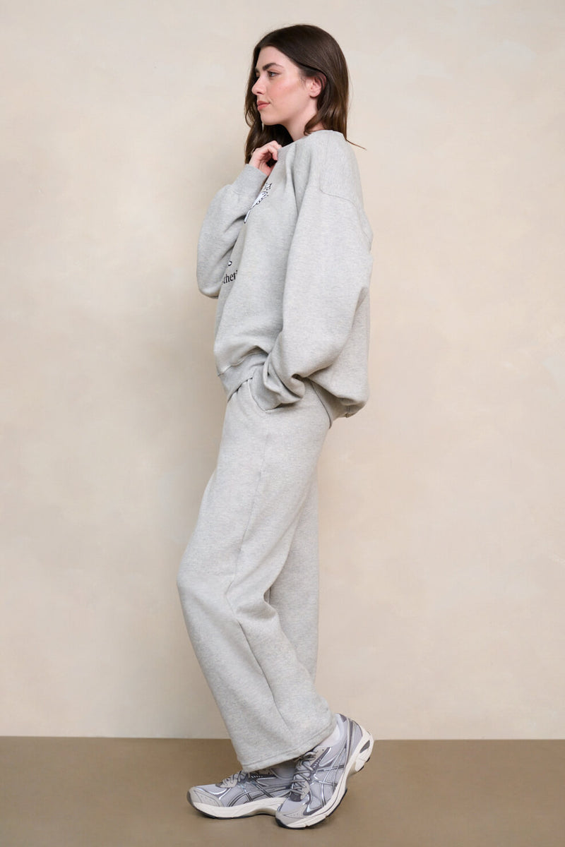 "a Team Roxie Unisex Crewneck